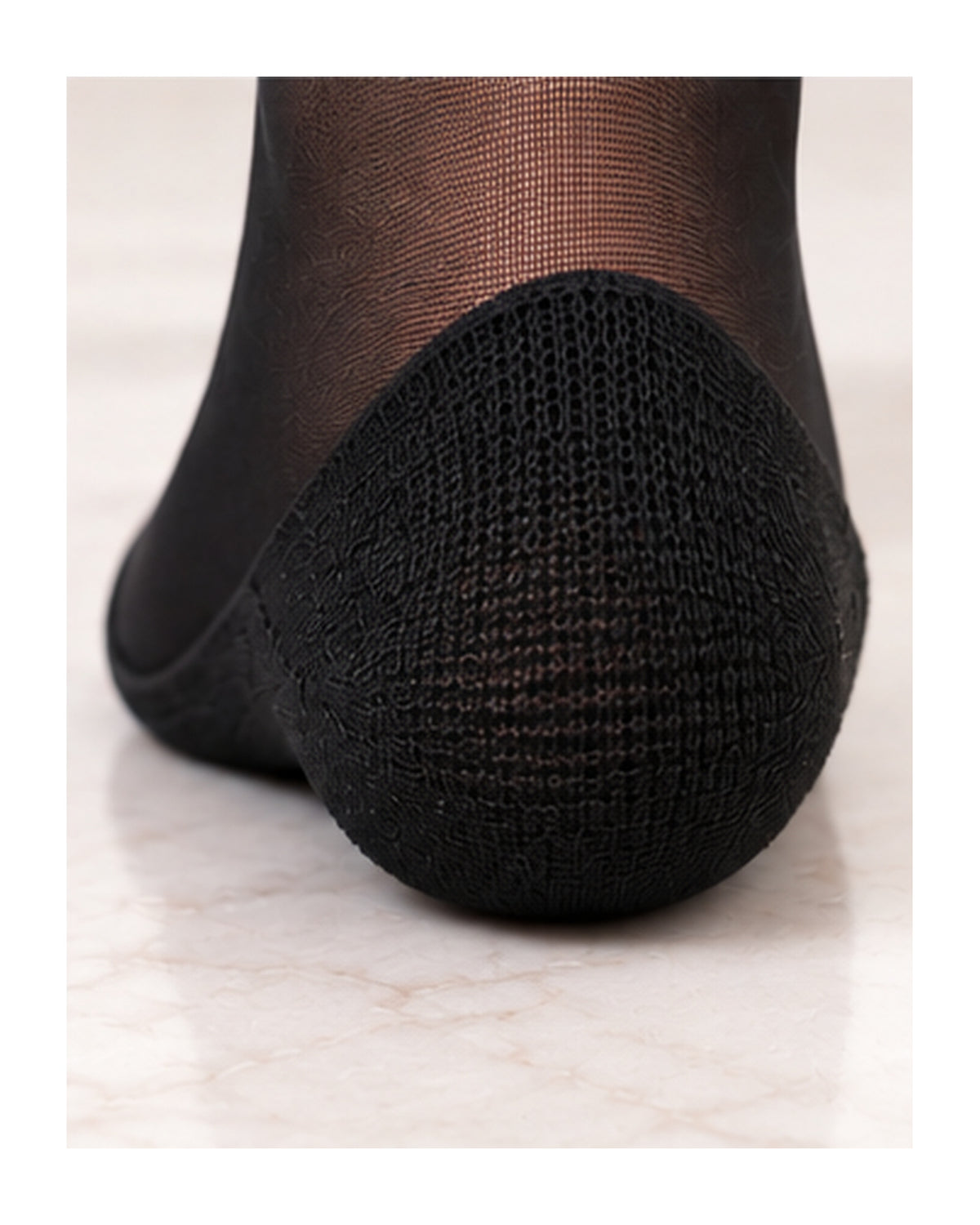 Close-up of the cushioned Black Invisi-Liner heel
