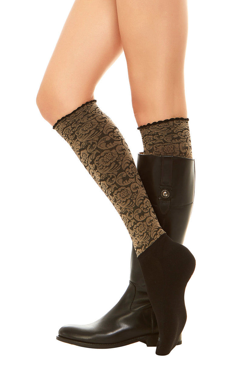 Sleek compression sock design in a floral print and attached performance athletic sock.